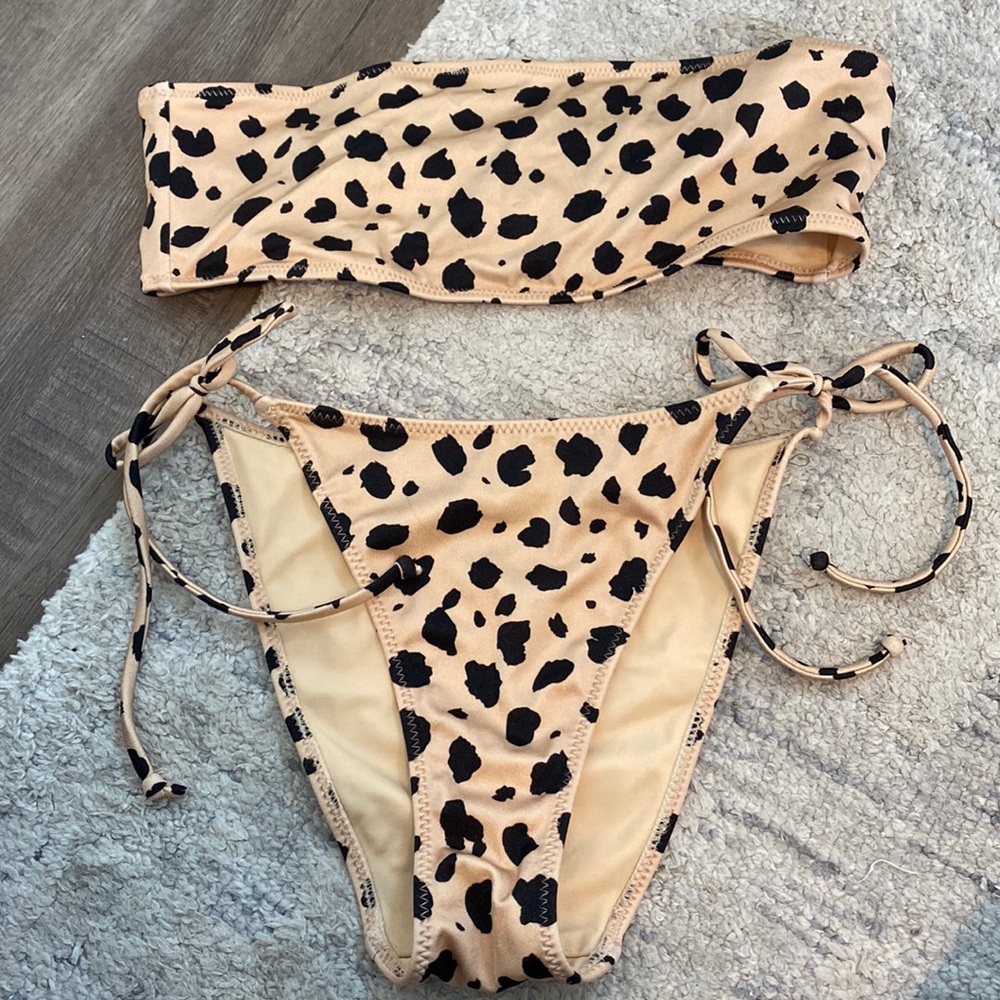 Gently worn pac sun bathing suit. Size small top and bottoms